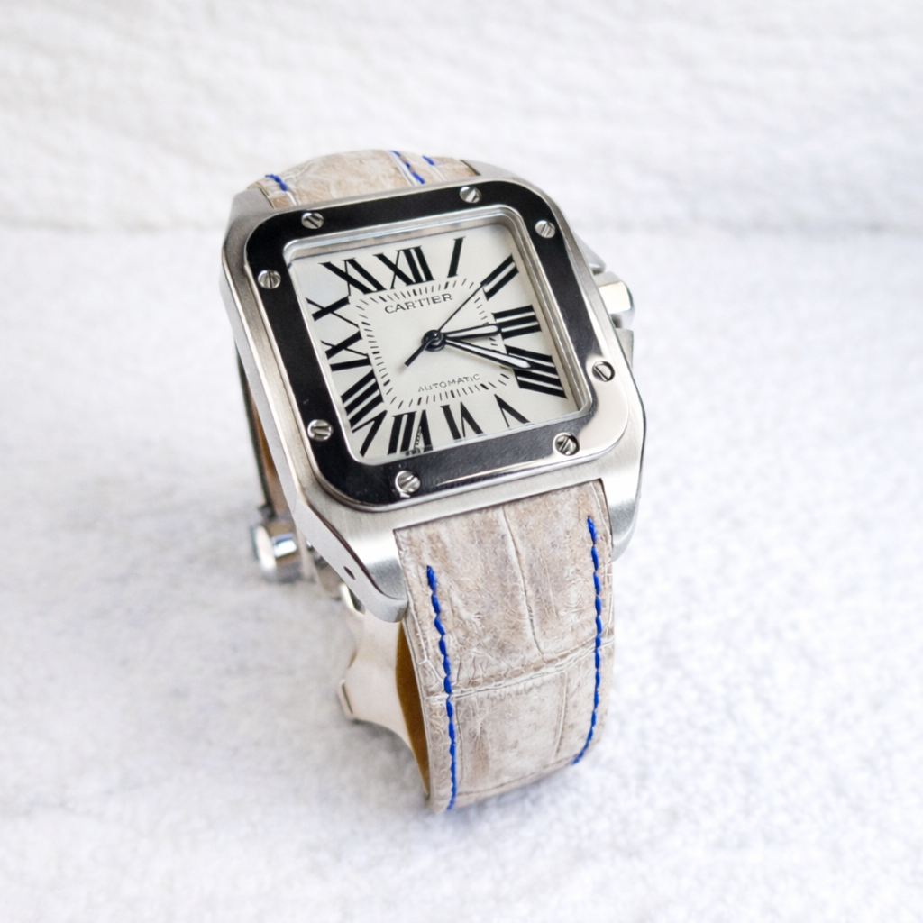 Cartier santos 100 xl on white Himalayan alligator with contrasting blue stitching 