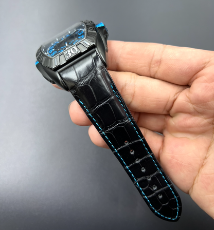 Watchstrapco black alligator strap with light blue stitching on the Franck muller 9900 watch. With matching light blue on the dial 