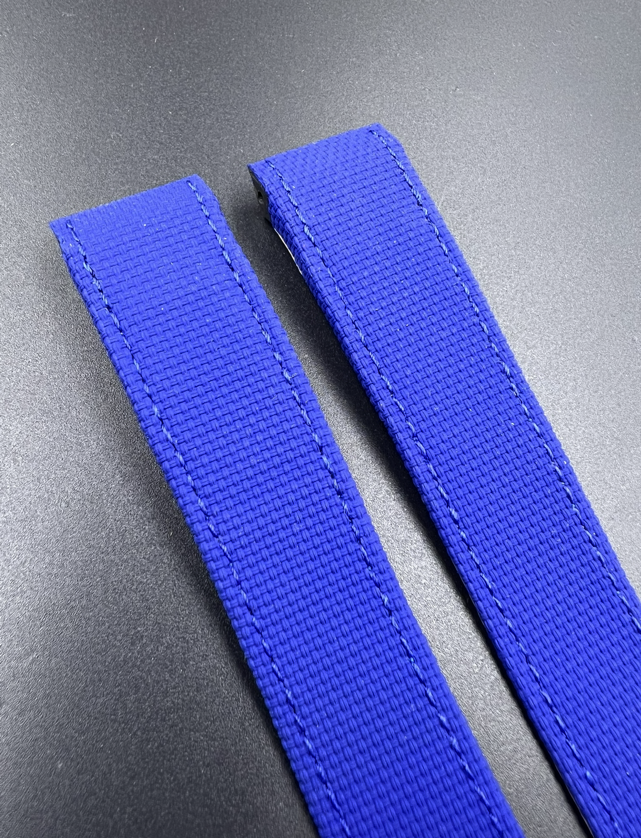 Close up of blue canvas leather strap for the Cartier santos 100 model